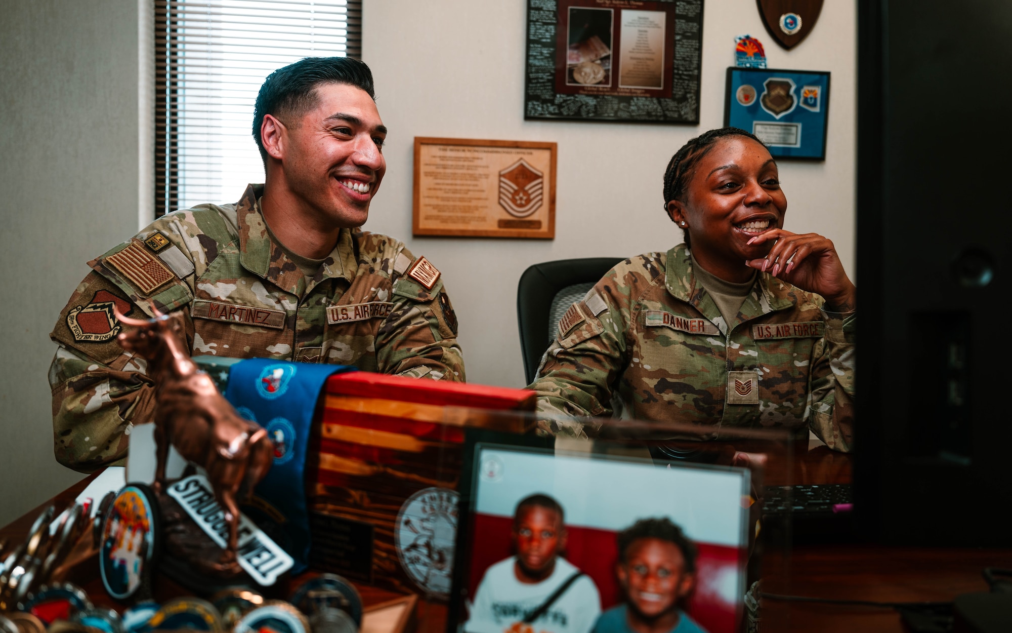 Staff Sgt. Christian Martinez (left), 56th Fighter Wing protocol specialist, and Capt. Nick Belinski (right), 309th Fighter Squadron instructor pilot, have been selected to join the U.S. Air Force Thunderbirds for the 2025-2026 show seasons. Martinez will support the team in scheduling, while Belinski will serve as the narrator and advance pilot.