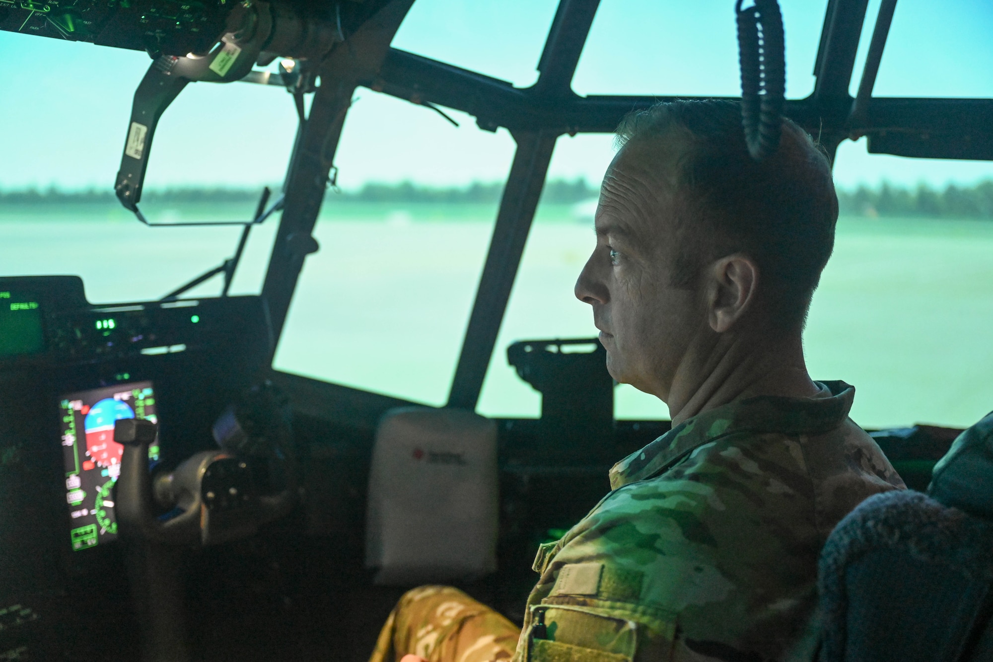 Chief Master Sgt. Keith M. Scott sits in a training simulator.
