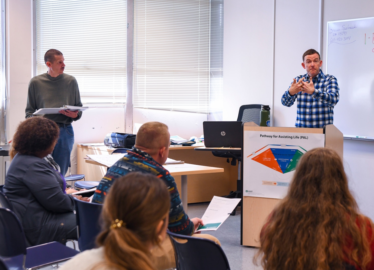 Cmdr. Jeremy Blythe, a chaplain with Naval Medical Center Camp Lejeune, instructs an Applied Suicide Intervention Skills Training (ASIST) lesson during a suicide prevention workshop at John A. Lejeune Education Center on September9, 2024. The workshop teaches participants to recognize and intervene in situations where someone may be considering suicide.