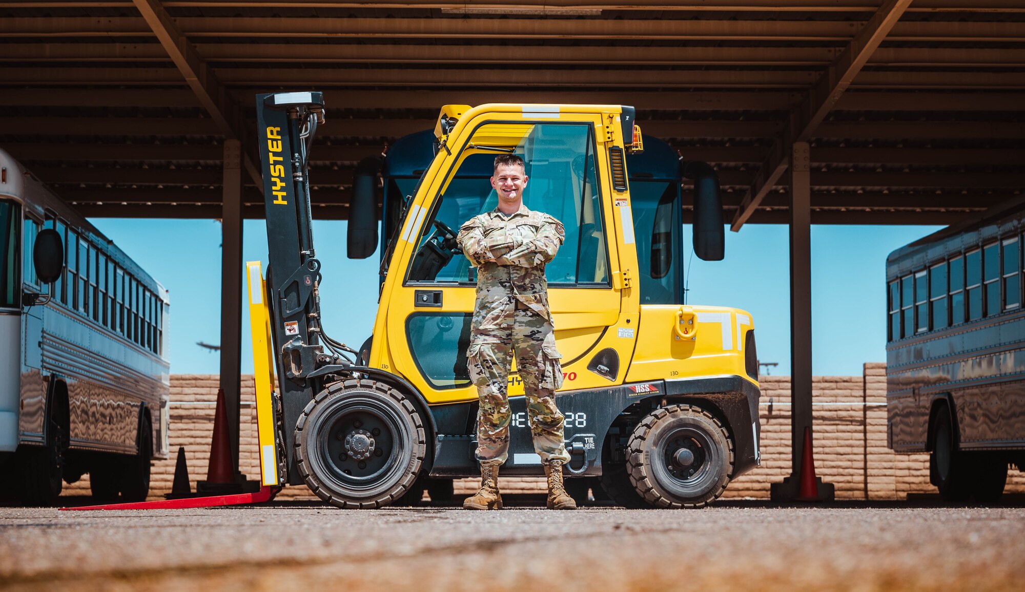 U.S. Air Force Senior Airman Mykhailo Khromiak, 56th Logistics Readiness Squadron ground transportation operator, poses for an environmental photo.