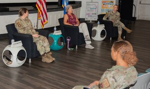 Guest panelists answer questions during a Women’s Equality Day panel