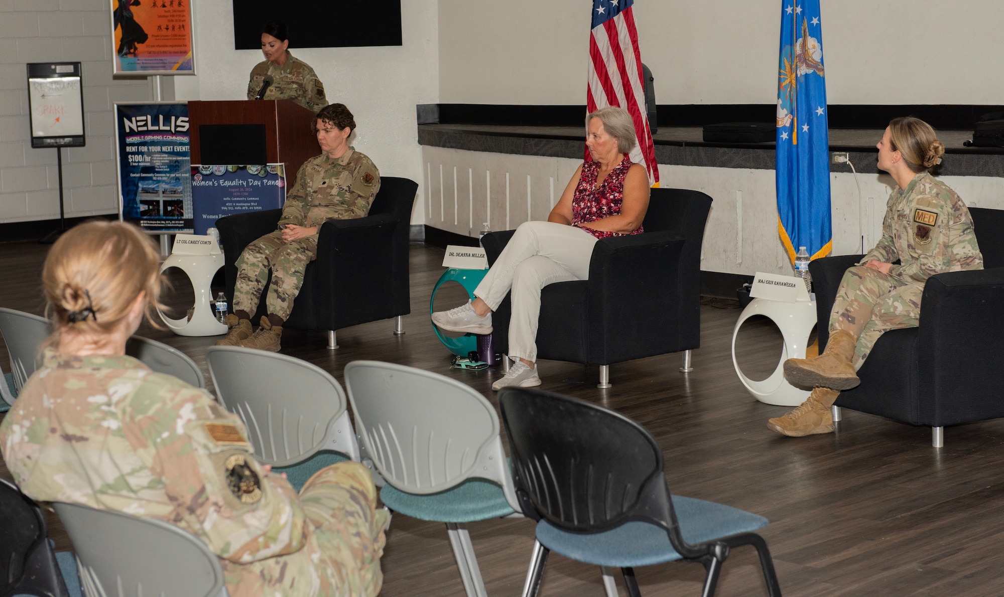 Guest panelists speak during a Women’s Equality Day panel event