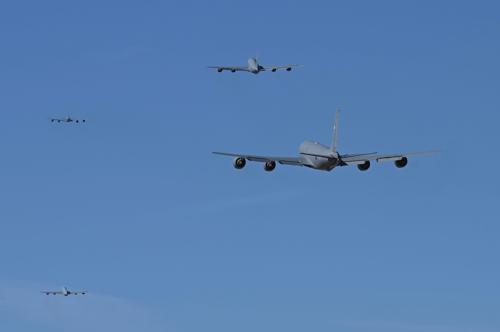 KC-135 Stratotankers assigned to the 92nd Air Refueling Wing take off during exercise Titan Fury 24-7 at Fairchild Air Force Base, Washington, Sept. 13, 2024. The KC-135s conducted minimum-interval takeoffs, a critical procedure used in aviation to ensure that aircraft can safely take off and climb to their assigned altitude without interfering with other aircraft's flight paths. Titan Fury is a recurring total force exercise that ensures Fairchild’s Airmen are trained and ready to provide Rapid Global Mobility at a moment’s notice in support of strategic deterrence and the National Defense Strategy. This exercise is an example of how the 92nd ARW is engaged, postured and ready with a credible force to assure, deter and defend in an increasingly complex security environment. (U.S. Air Force photo by Airman 1st Class Samantha Thorn)
