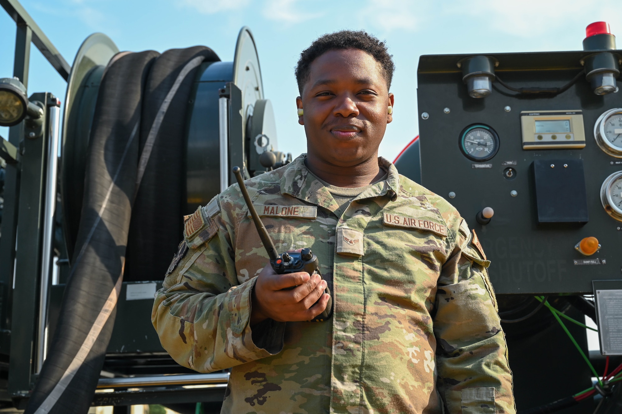 U.S. Air Force Airman 1st Class Jon Malone, a fuels distribution operator assigned to the 92nd Logistics Readiness Squadron, poses for a photo during exercise Titan Fury 24-7 at Fairchild Air Force Base, Washington, Sept. 9, 2024. Malone assessed and performed preventive maintenance on fueling vehicles and equipment to meet mission requirements. Titan Fury is a recurring total force exercise that ensures Fairchild’s Airmen are trained and ready to provide Rapid Global Mobility at a moment’s notice in support of strategic deterrence and the National Defense Strategy. This exercise is an example of how the 92nd ARW is engaged, postured and ready with a credible force to assure, deter and defend in an increasingly complex security environment. (U.S. Air Force photo by Airman 1st Class Samantha Thorn)