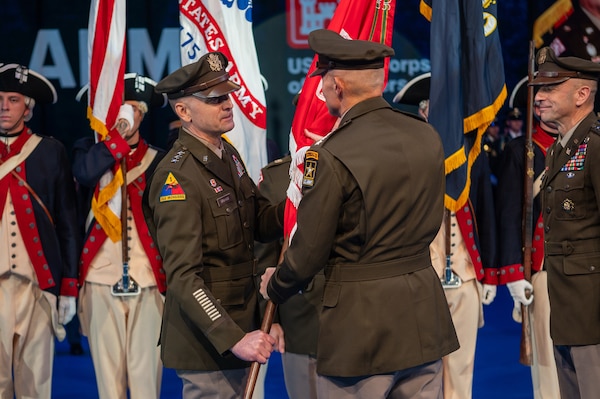 Lt. Gen. William H. "Butch" Graham Jr., incoming commander of the U.S. Army Corps of Engineers (USACE), receives the USACE colors from U.S. Army Chief of Staff Randy A. George during the Change of Command for the U.S. Army Corps of Engineers on Sept. 13, 2024. During the Change of Command, Lt. Gen. Graham assumed command of the U.S. Army Corps of Engineers from Lt. Gen. Scott Spellmon. The event included a promotion ceremony for now-Lt. Gen. Graham and a retirement ceremony in honor of Lt. Gen. Spellmon. The ceremonies were hosted by U.S. Army Chief of Staff Gen. Randy A. George and conducted by the 3d U.S. Infantry Regiment (The Old Guard) and The United States Army Band in Conmy Hall on Joint Base Myer - Henderson Hall, Va. (U.S. Army photo by Bernardo Fuller)