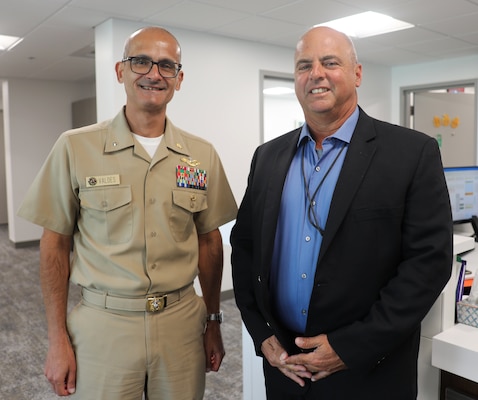 Rear Adm. Guido Valdes, commander of Naval Medical Forces Pacific and director of Defense Health Network Pacific Rim meets Dan Carreño, executive director of Naval Air Warfare Center Weapons Division (NAWCWD) located at Naval Air Weapons Station China Lake, Calif. Valdes was the keynote speaker for the NAWCWD’s 2024 Hispanic Heritage Observance, Sep. 10. The event, themed "Pioneers of Change: Shaping the Future Together," highlighted the contributions of Hispanic Americans to the Navy and the Nation. (Navy photo by Arsenio R. Cortez Jr.)