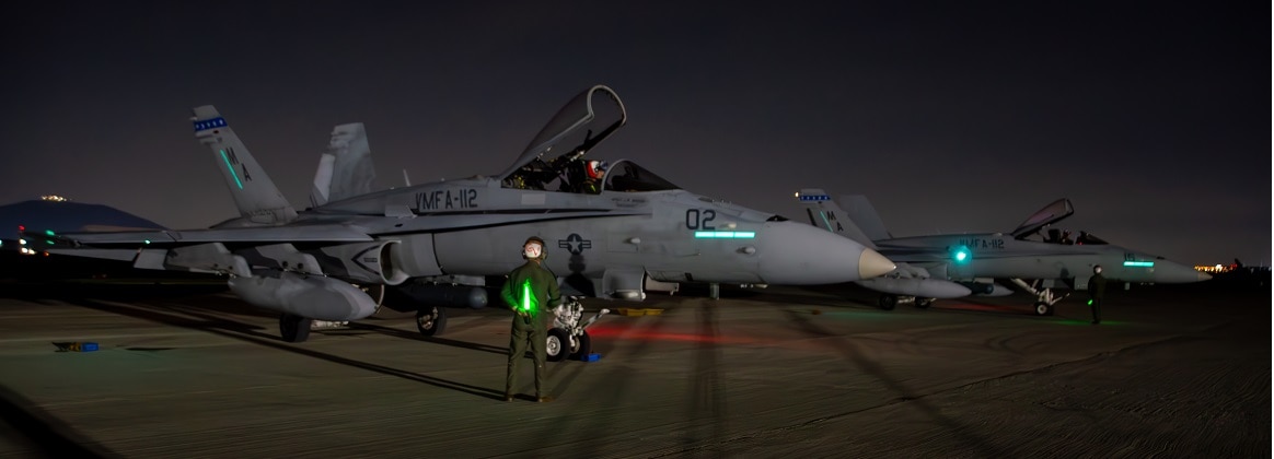 U.S. Marines with Marine Fighter Attack Squadron 112 (VMFA-112), 4th Marine Aircraft Wing, recover aircraft at night after flight operations during Exercise UNITAS LXV in Santiago, Chile, Sept. 7, 2024.