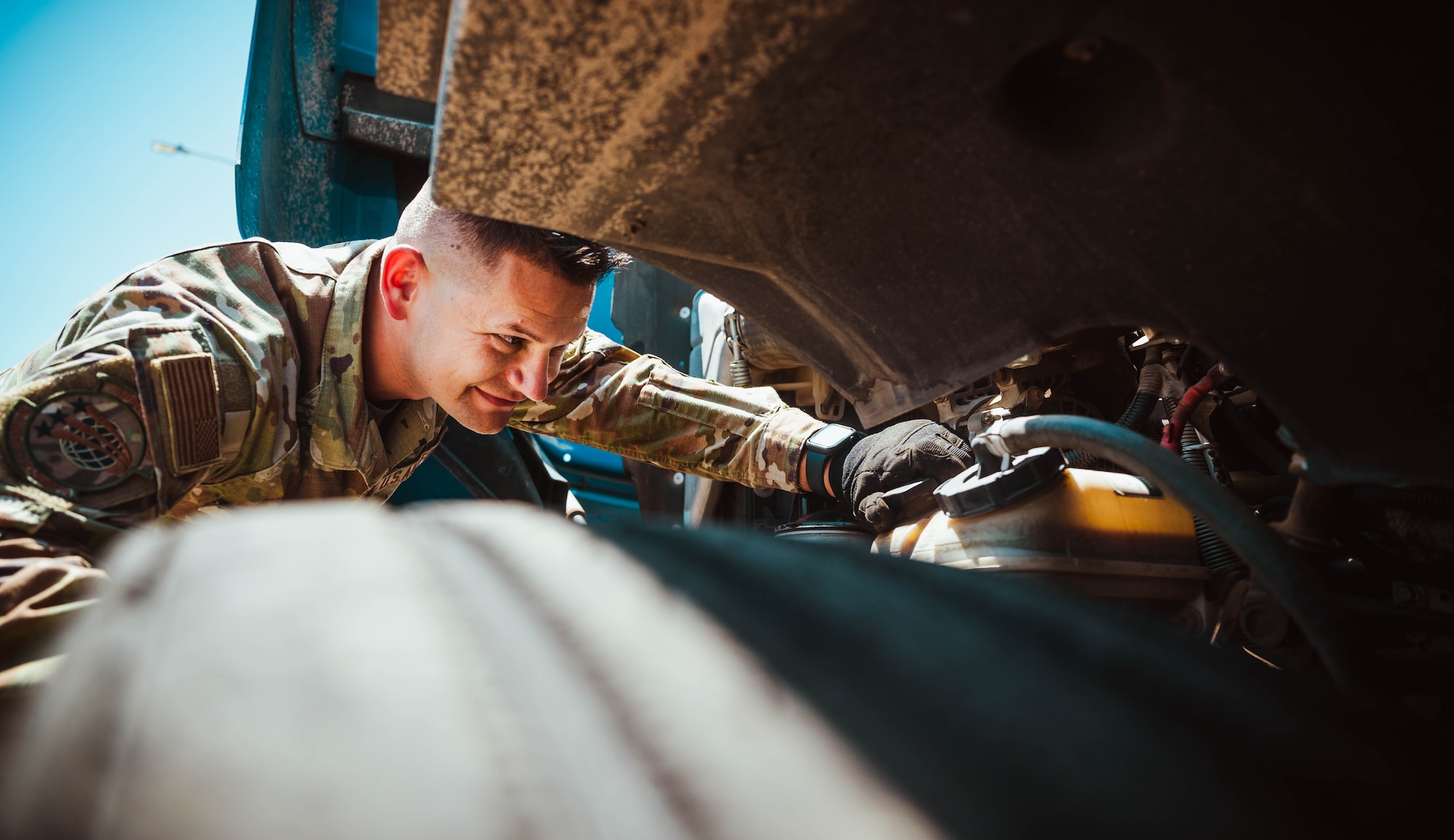 U.S. Air Force Senior Airman Mykhailo Khromiak, 56th Logistics Readiness Squadron ground transportation operator, inspects a vehicle