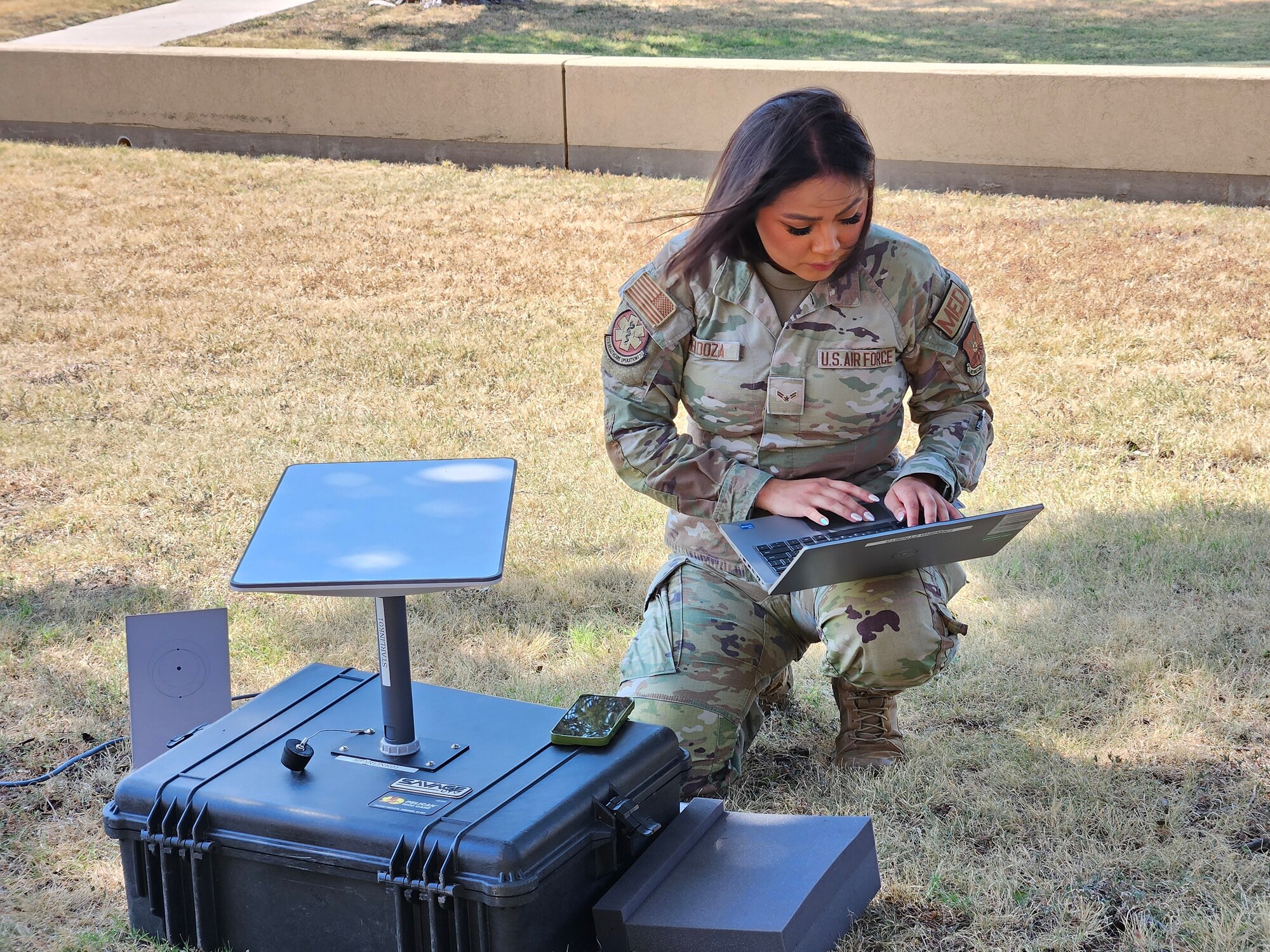 U.S. Air Force Senior Airman Jamie Mendoza, 7th Health Care Operations Squadron aerospace medical technician, demonstrates STARDOC’s capabilities on Dyess Air Force Base, Texas. This initiative equips medics with a portable, high-speed internet connection able to connect to electronic health records and other medical systems no matter how remote or austere the location. (Courtesy photo)
