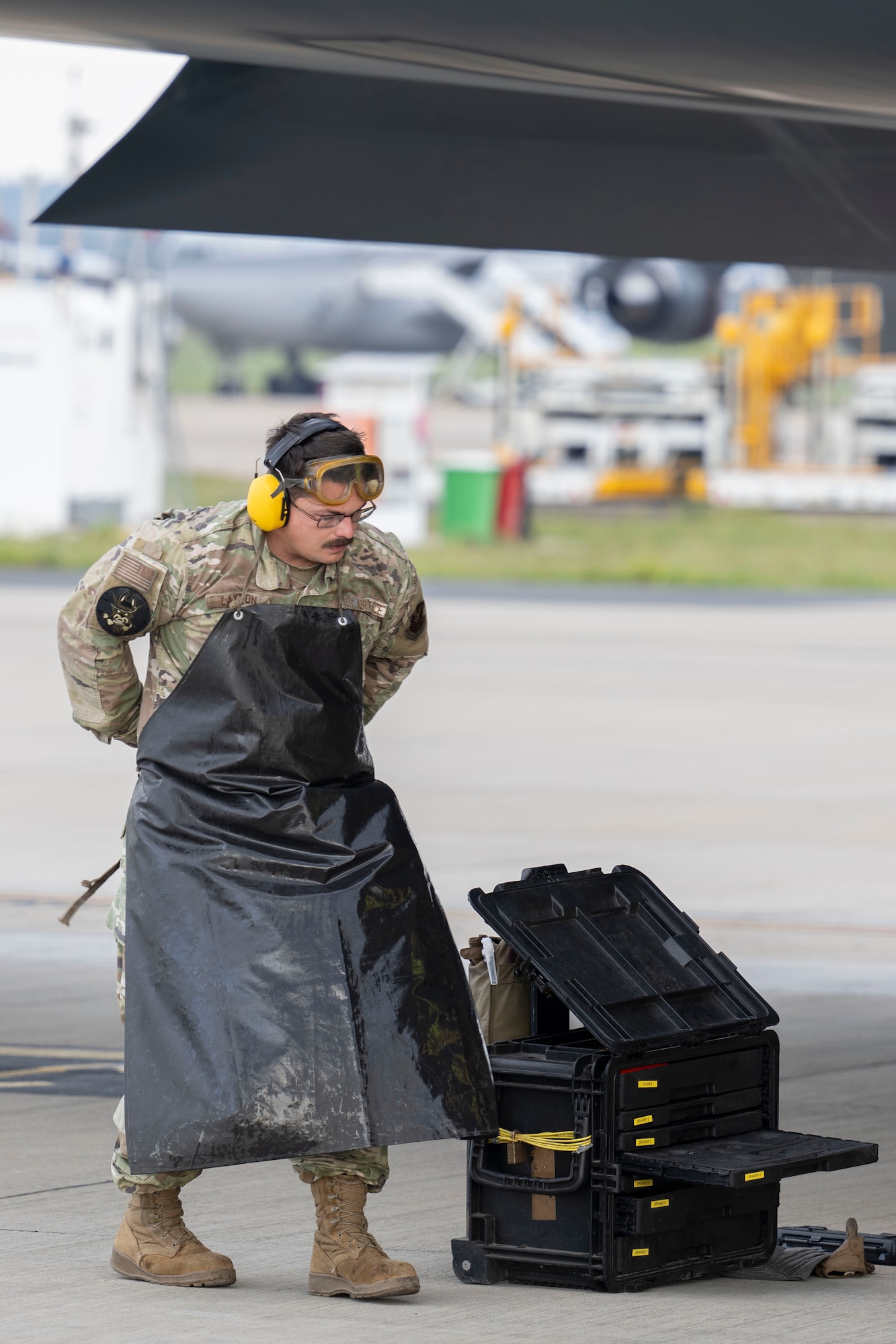 U.S. Air Force Joshua Layton, 110th Expeditionary Bomb Squadron crew chief lead, prepares to conduct repairs to a B-2 Spirit stealth bomber during a Bomber Task Force deployment at Royal Australian Air Force Base Amberley, Australia, Sept. 9, 2024. U.S. Indo-Pacific Command routinely and visibly demonstrates commitment to its allies and partners through the employment of military forces, demonstrating strategic predictability, while becoming more operationally unpredictable to adversaries. (U.S. Air Force photo by Tech. Sgt. Anthony Hetlage)