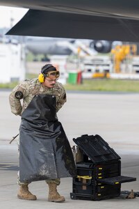 U.S. Air Force Joshua Layton, 110th Expeditionary Bomb Squadron crew chief lead, prepares to conduct repairs to a B-2 Spirit stealth bomber during a Bomber Task Force deployment at Royal Australian Air Force Base Amberley, Australia, Sept. 9, 2024. U.S. Indo-Pacific Command routinely and visibly demonstrates commitment to its allies and partners through the employment of military forces, demonstrating strategic predictability, while becoming more operationally unpredictable to adversaries. (U.S. Air Force photo by Tech. Sgt. Anthony Hetlage)