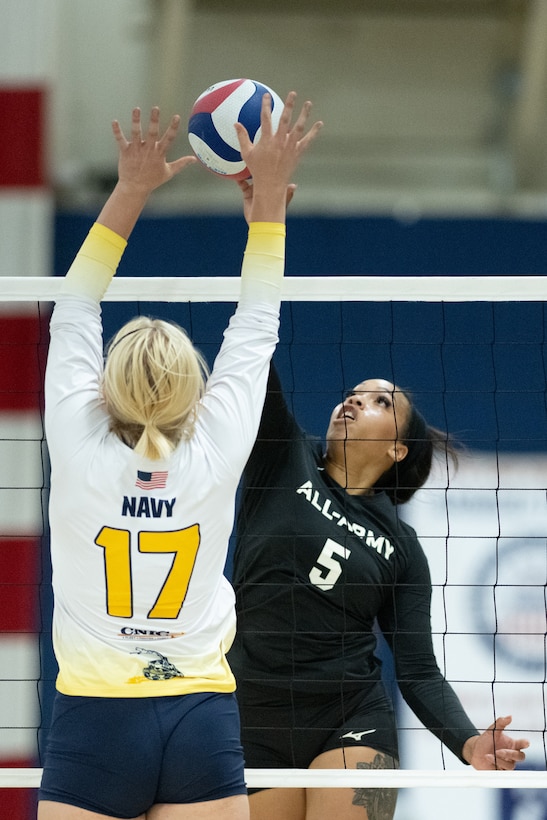 Army Staff Sgt. Gabriel Dunlap spikes a ball during the 2024 Armed Forces Men’s and Women’s Volleyball Championships at Fort Carson, Colo. Sept. 13, 2024. (DoD photo by EJ Hersom)