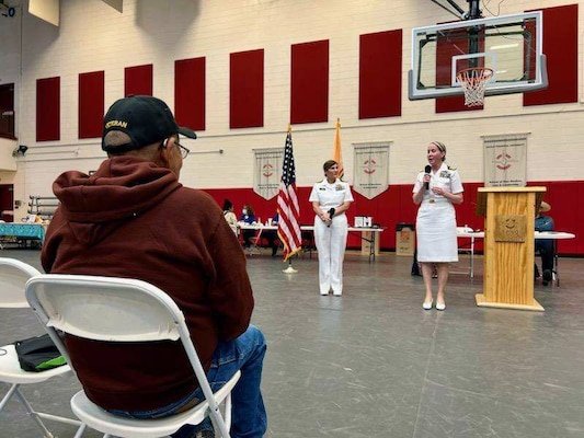 Cmdr. Jessica L. McNulty, the director of public affairs and outreach and a special assistant to the Navy Surgeon General and chief, U.S. Navy Bureau of Medicine and Surgery (BUMED), and Capt. Shauna O’Sullivan, a rheumatologist and Navy Medical Corps career planner at BUMED, speak to veterans at Navajo Technical University (NTU) during Albuquerque Navy Week, Sept. 13.