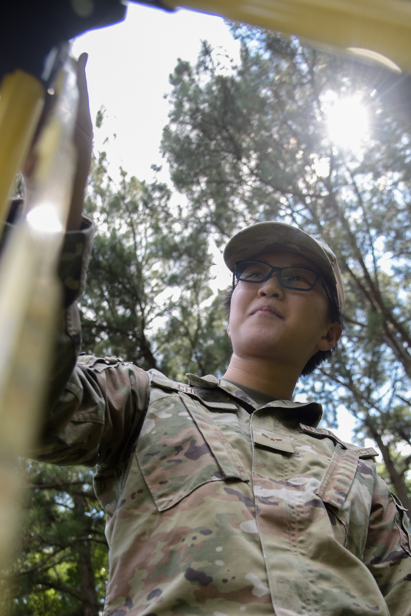 A1C Yuxin Chen, 4th CES engineering journeyman, measures the distance from the ground to a GPS.