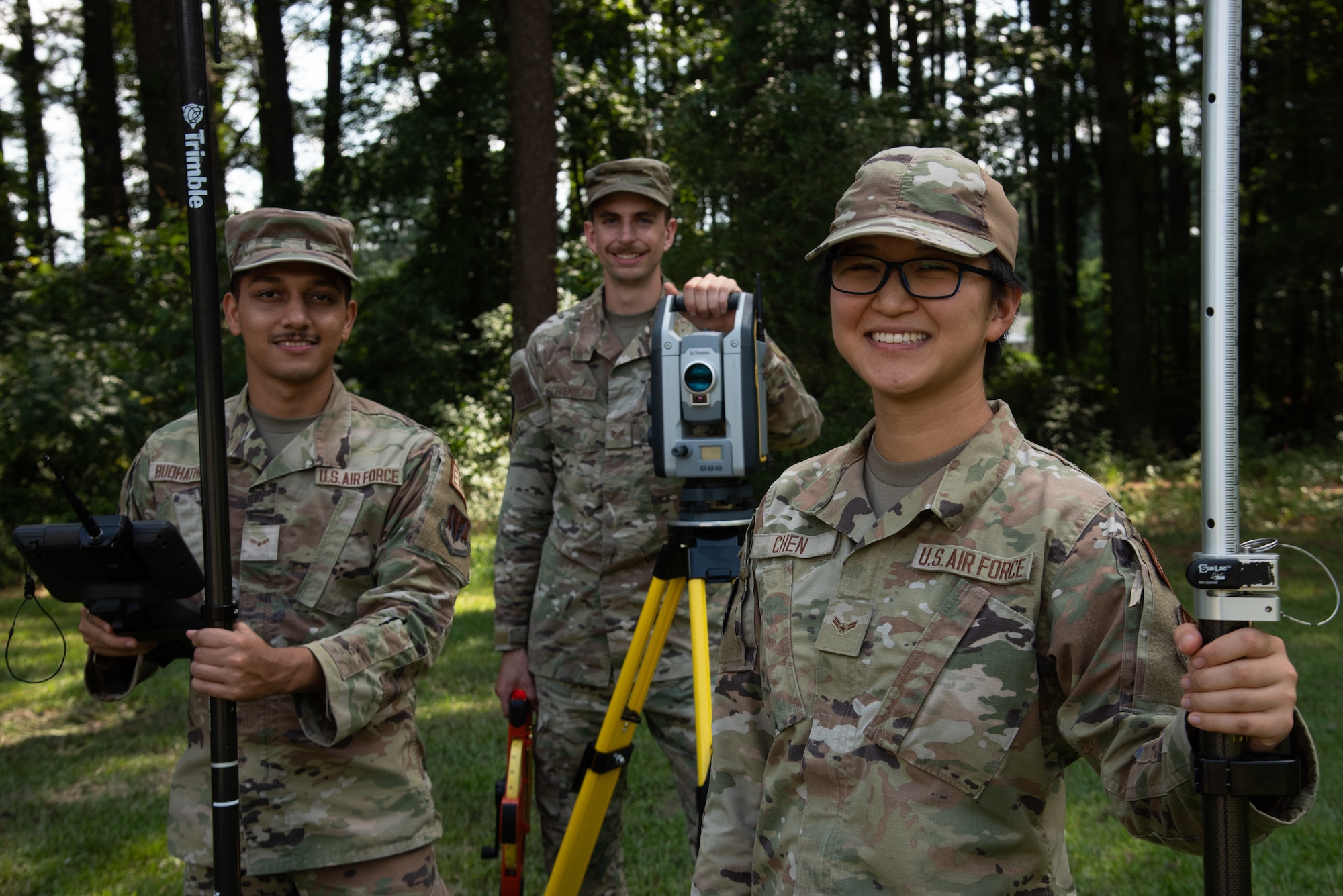 Airmen of the 4th CES engineer section stand with their Global Positioning System (GPS) equipment.