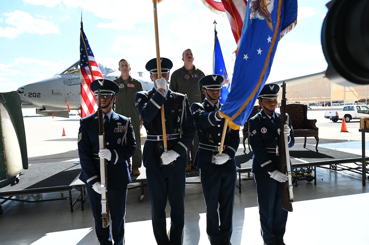 U.S. Airmen assigned to the Davis-Monthan Air Force Base Honor Guard present the colors during the 354th Fighter Squadron inactivation ceremony, at DMAFB, Arizona, Sept. 13, 2024. The colors, or flags, are posted at a military ceremony marking an anniversary or significant event. (U.S. Air Force photo by Staff Sgt. Abbey Rieves)
