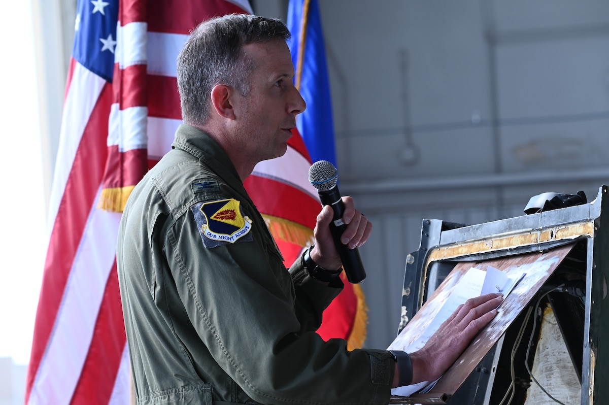 U.S. Air Force Col. Sean Hall, 355th Operations Group commander, speaks during the 354th FS inactivation ceremony at Davis-Monthan Air Force Base, Arizona, Sept. 13, 2024. After 9/11, the 354th FS deployed to Afghanistan seven times from 2002-2020 to support Operation Enduring Freedom and Operation Freedom’s Sentinel. (U.S. Air Force photo by Staff Sgt. Abbey Rieves)