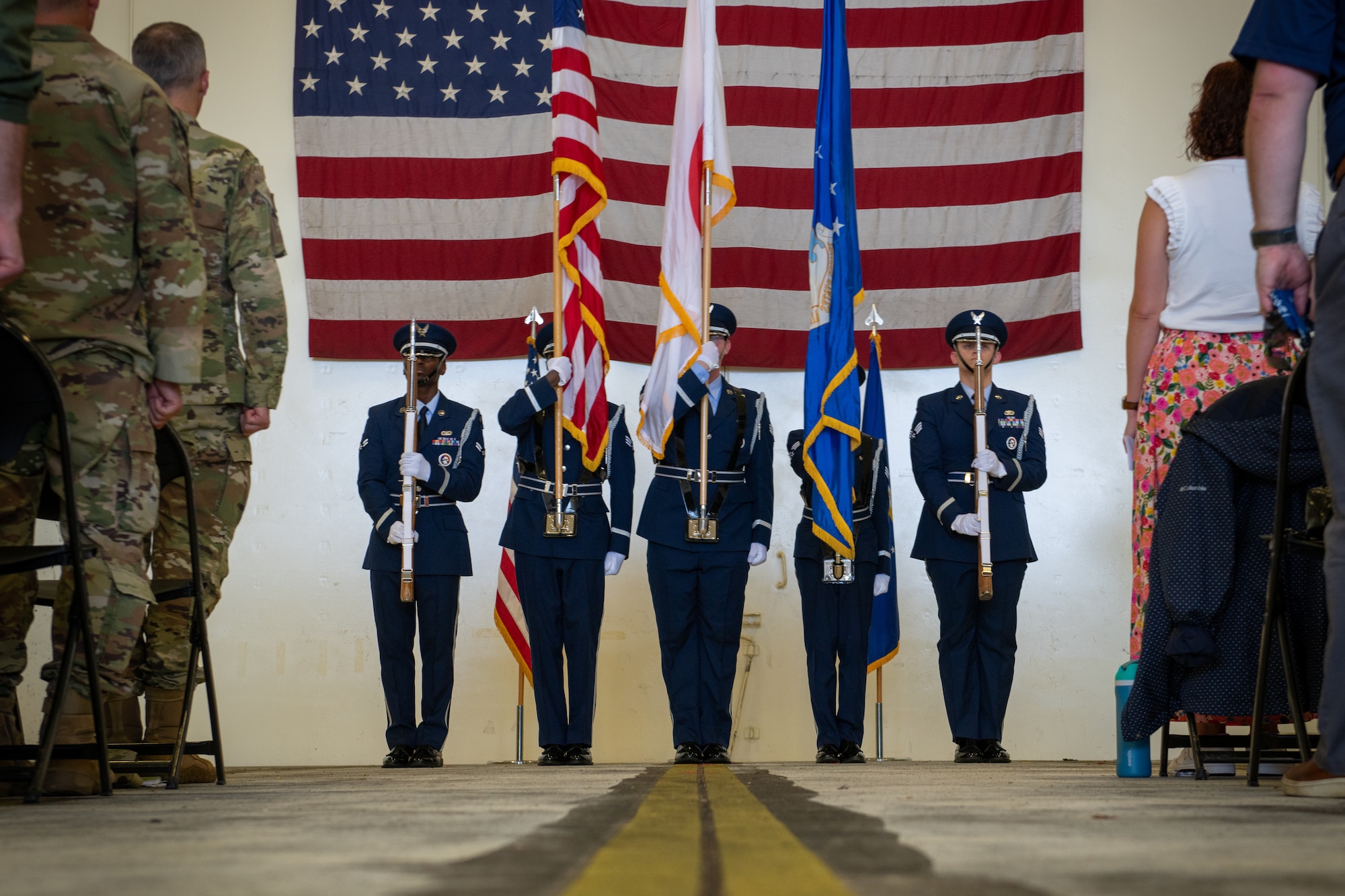Members of the Honor Guard presenting the colors during a change of command