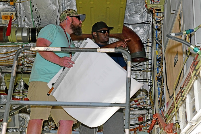 Men working on aircraft