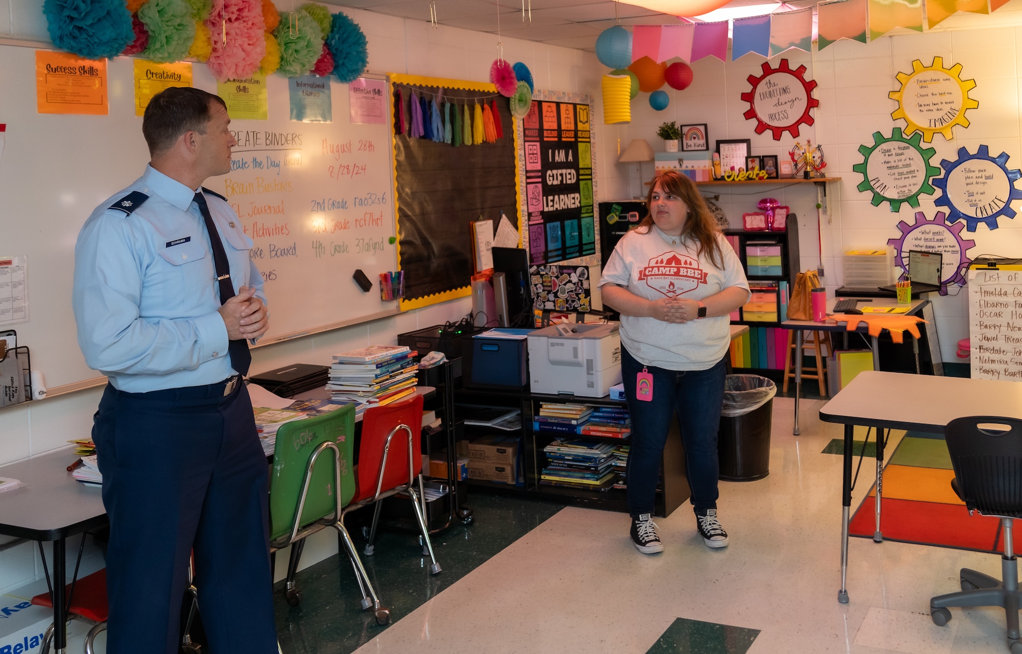 U.S. Air Force Lt. Col. Michael Schrama, 81st Training Wing military school advisor, speaks with a teacher during a tour of the Back Bay Elementary School, Biloxi, Mississippi, Sept. 9, 2024.