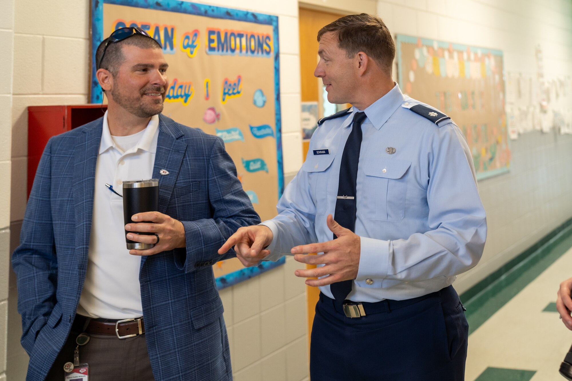U.S. Air Force Lt. Col. Michael Schrama, 81st Training Wing military school advisor, and Mr. Marcus Boudreaux, Biloxi Public School superintendent, interact during a tour of the Back Bay Elementary School, Biloxi, Mississippi, Sept. 9, 2024.