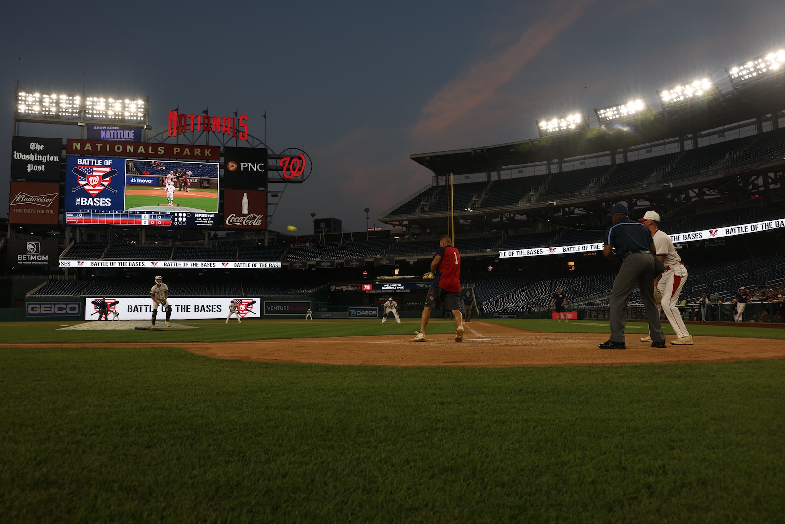 U.S. service members assigned to Marine Corps Base Quantico and Marine Barracks Washington participate in the Battle of the Bases, at Nationals Park, Washington, D.C., Sept. 14, 2024. This softball tournament, hosted by the Washington Nationals, brings together the best teams from military bases across the National Capital Region. (U.S. Marine Corps photo by Lance Cpl. Jeffery Stevens)