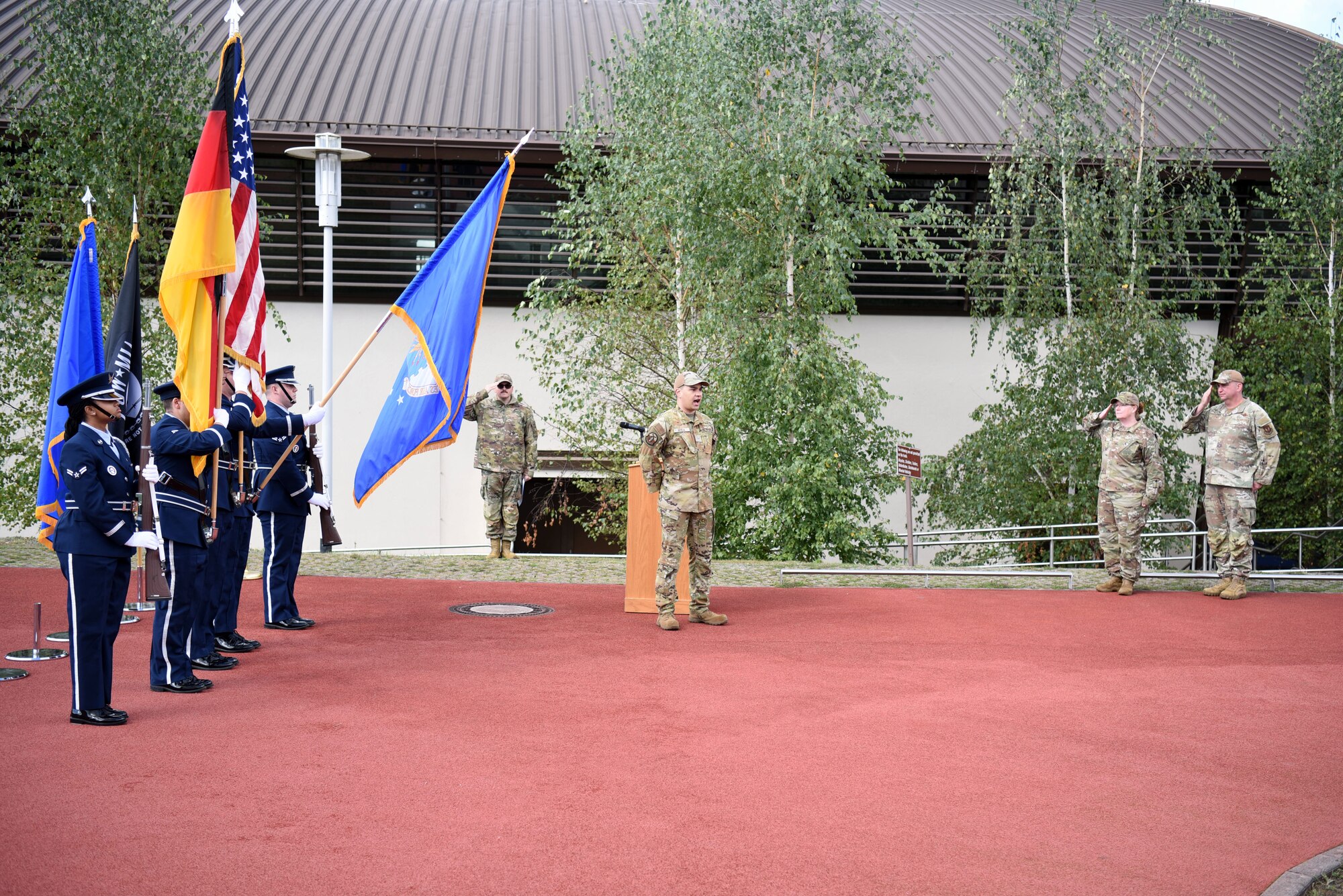 Members of the Ramstein Honor Guard present the colors as the U.S. and German national anthems are sung prior to the start of the 24-hour walk/run that honored prisoners of war and those missing in action at Ramstein Air Base, Germany, Sept. 12, 2024.