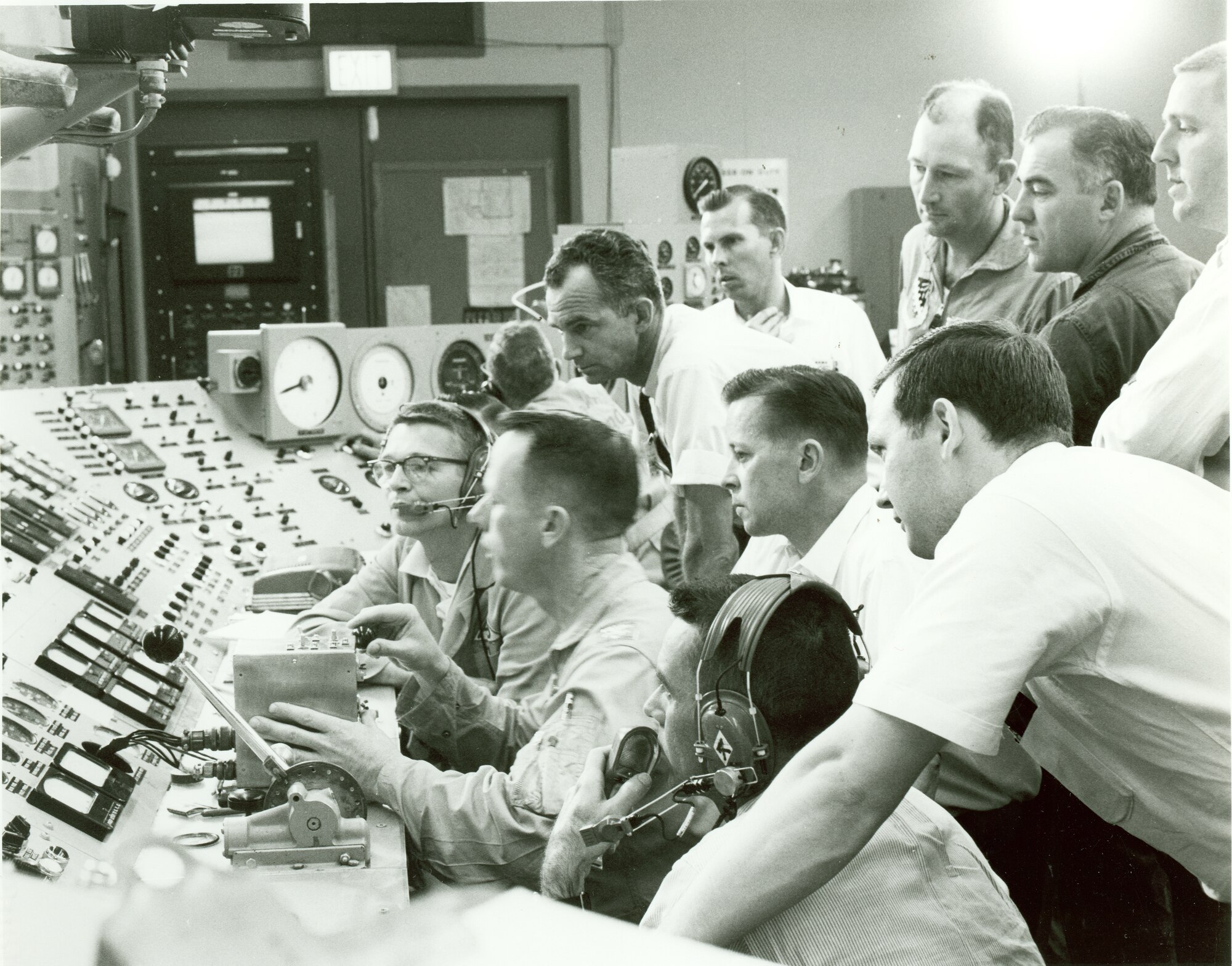 Pilots who were to perform the first test flights for the XB-70 Valkyrie operate the YJ93 engine, the powerplant of the XB-70, while the engine is tested under simulated flight conditions in May 1964 in the Rocket Test Facility at Arnold Air Force Base, Tenn., headquarters of Arnold Engineering Development Complex. This was done to help the pilots familiarize themselves with the performance characteristics of the engine prior to the first XB-70 flight, which occurred on Sept. 21, 1964. Beginning in the late 1950s and continuing through the mid-1960s, tests were conducted at Arnold AFB in support of the XB-70 program. Only two Valkyries were built, with only one of the pair remaining. (U.S. Air Force photo)