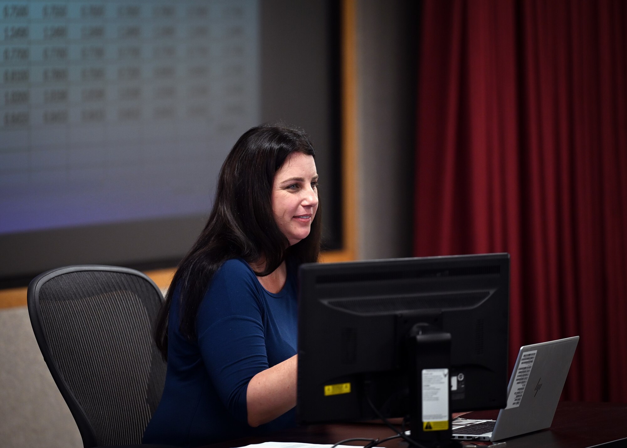 Alyson Kolding, 30th Contracting Squadron contracting officer, debriefs with U.S. Space Force Col. Mark Shoemaker, Space Launch Delta 30 commander