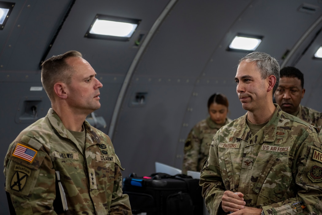 Army Lt. Gen speaks with Air Force Col. on a KC-46A Pegasus