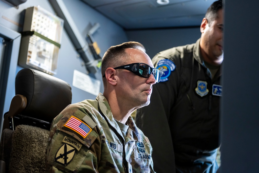 Army Lt. Gen. sits at the seat for a boom controller on a KC-46A Pegasus