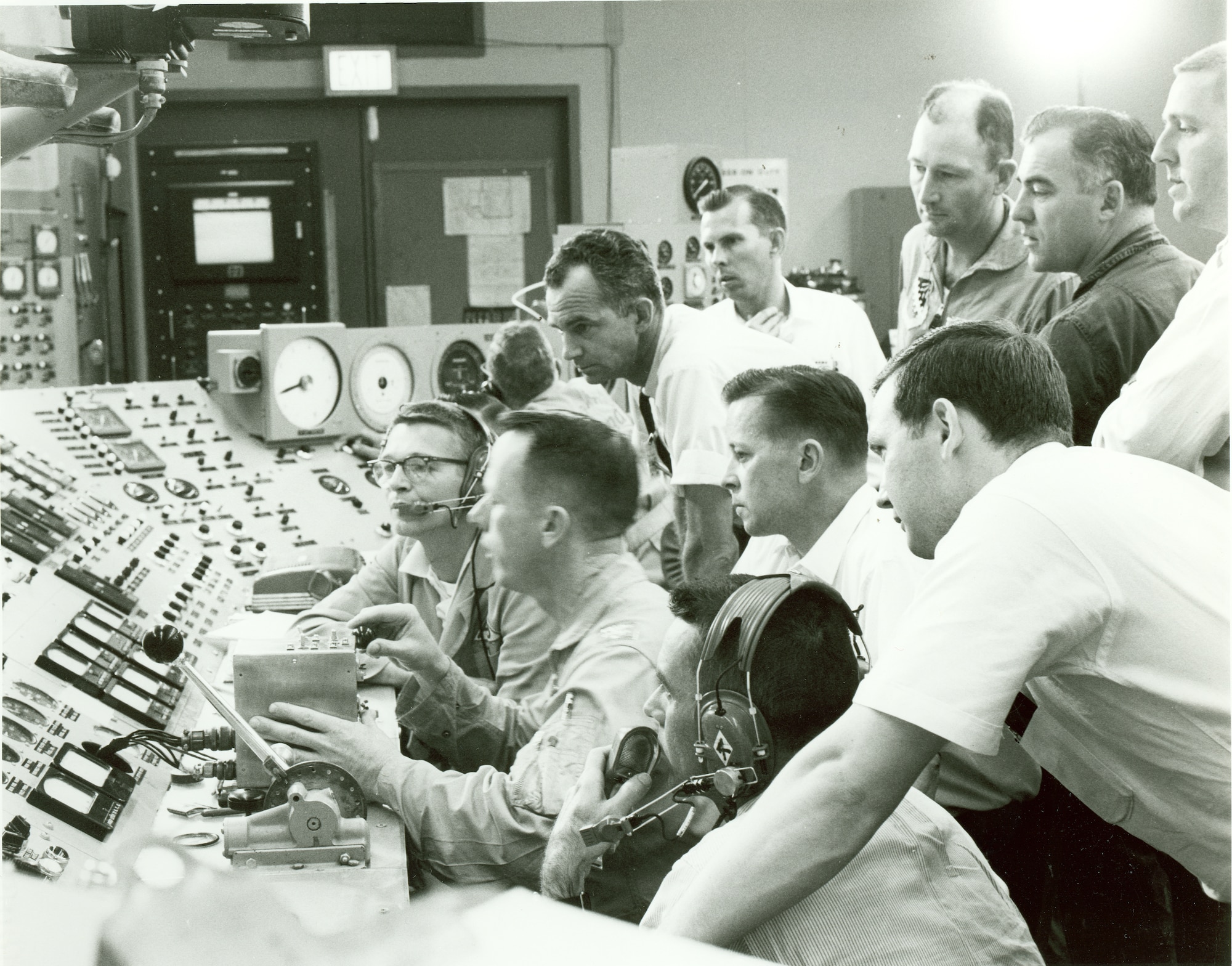 Pilots who were to perform the first test flights for the XB-70 Valkyrie operate the YJ93 engine, the powerplant of the XB-70, while the engine is tested under simulated flight conditions in May 1964 in the Rocket Test Facility at Arnold Air Force Base, Tenn., headquarters of Arnold Engineering Development Complex. This was done to help the pilots familiarize themselves with the performance characteristics of the engine prior to the first XB-70 flight, which occurred on Sept. 21, 1964. Beginning in the late 1950s and continuing through the mid-1960s, tests were conducted at Arnold AFB in support of the XB-70 program. Only two Valkyries were built, with only one of the pair remaining. (U.S. Air Force photo)