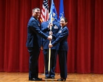Lt. Col. Cassandra Lee assumes command of the 426th Cyberspace Operations Squadron and is passed the colors by Col. Richard Wallace, 960th Cyberspace Operations Group commander, at Joint Base San Antonio-Lackland, Texas on September 15th, 2024. (US Air Force photo by Alex Dieguez)