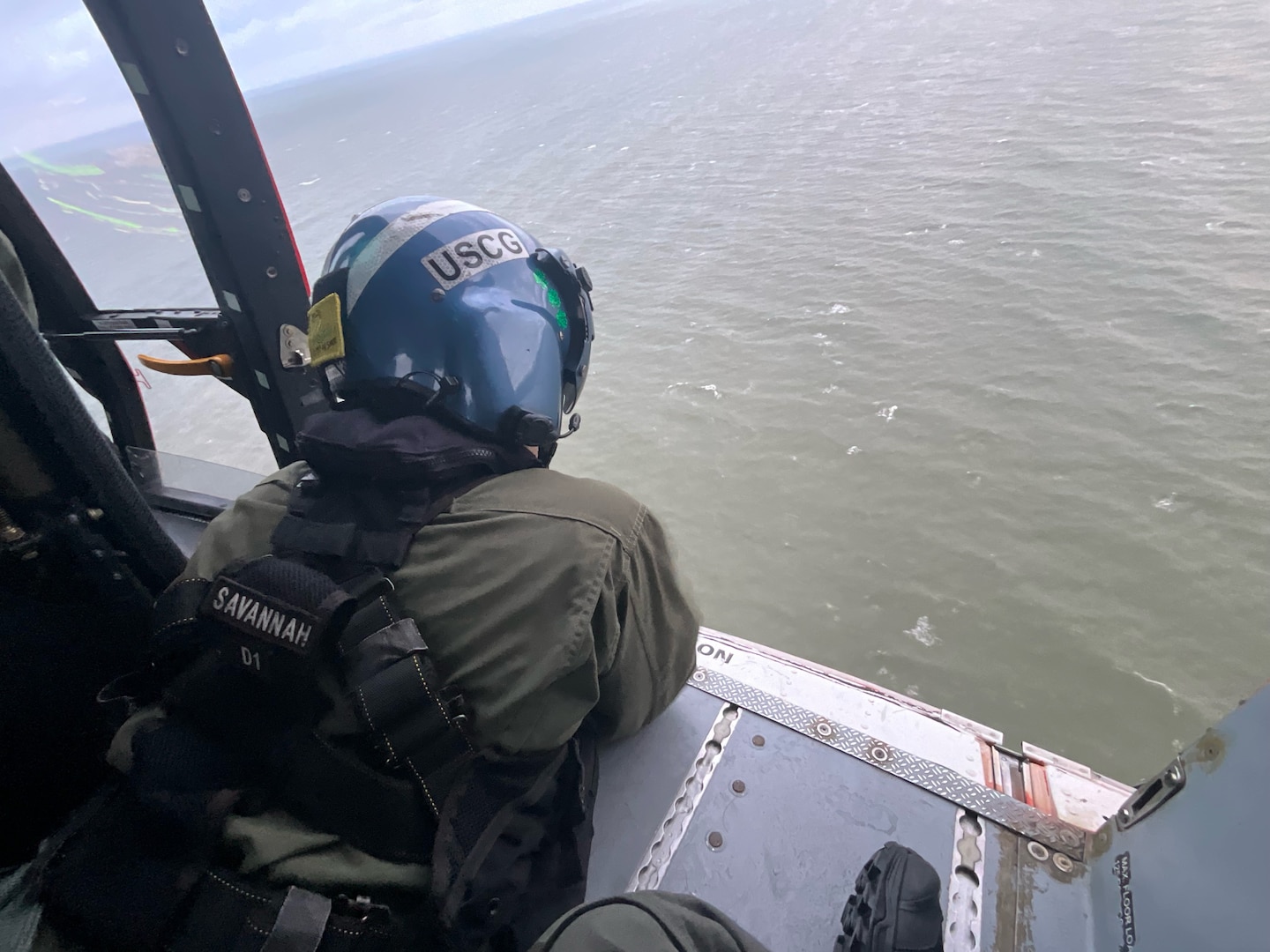 A Coast Guard Air Station Savannah helicopter crew searches for an adrift vessel during a search and rescue case near Bay Point Island, South Carolina, Sept. 15, 2024.