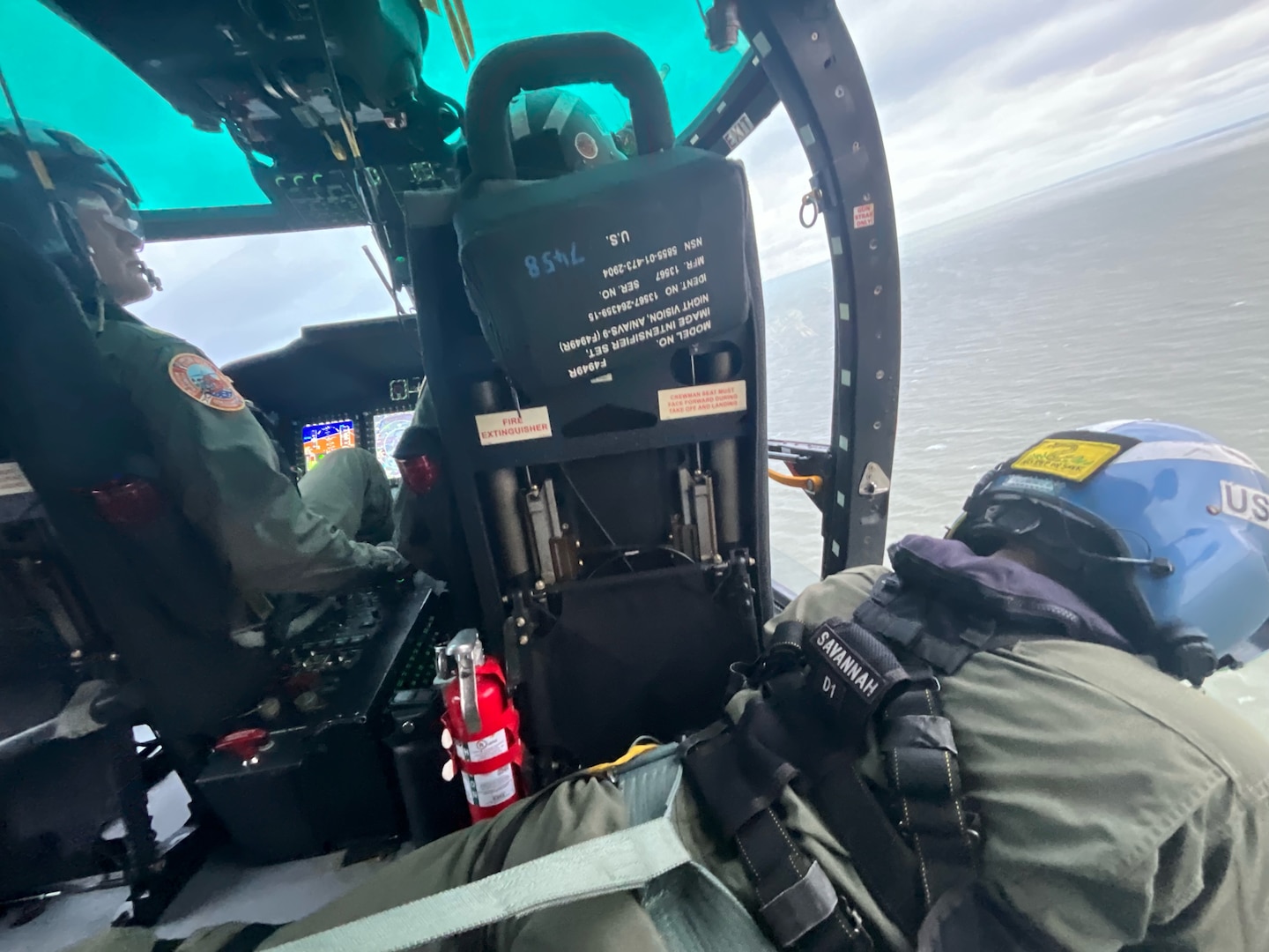 A Coast Guard Air Station Savannah helicopter crew searches for an adrift vessel during a search and rescue case near Bay Point Island, South Carolina, Sept. 15, 2024.