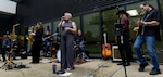 The Gene Monroe Band performs during Organizational Day at Walter Reed National Military Medical Center, held Sept. 13, 2024, to celebrate not only the dedication and the hard work of Walter Reed team members, but also the 13th anniversary of the coming together of Walter Reed Army Medical Center (WRAMC) and National Naval Medical Center (NNMC) to form WRNMMC, and the 173rd anniversary of the birth of Maj. (Dr.) Walter Reed, born on Sept. 13, 1851.