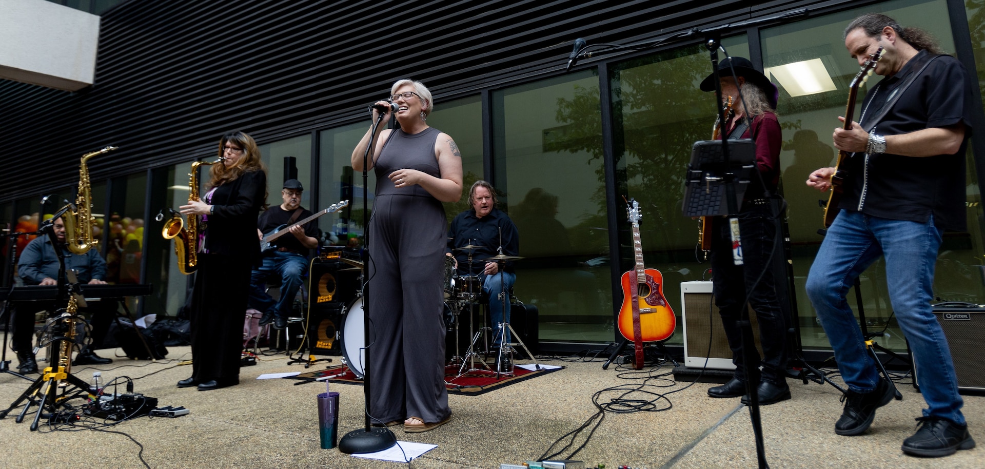 The Gene Monroe Band performs during Organizational Day at Walter Reed National Military Medical Center, held Sept. 13, 2024, to celebrate not only the dedication and the hard work of Walter Reed team members, but also the 13th anniversary of the coming together of Walter Reed Army Medical Center (WRAMC) and National Naval Medical Center (NNMC) to form WRNMMC, and the 173rd anniversary of the birth of Maj. (Dr.) Walter Reed, born on Sept. 13, 1851.