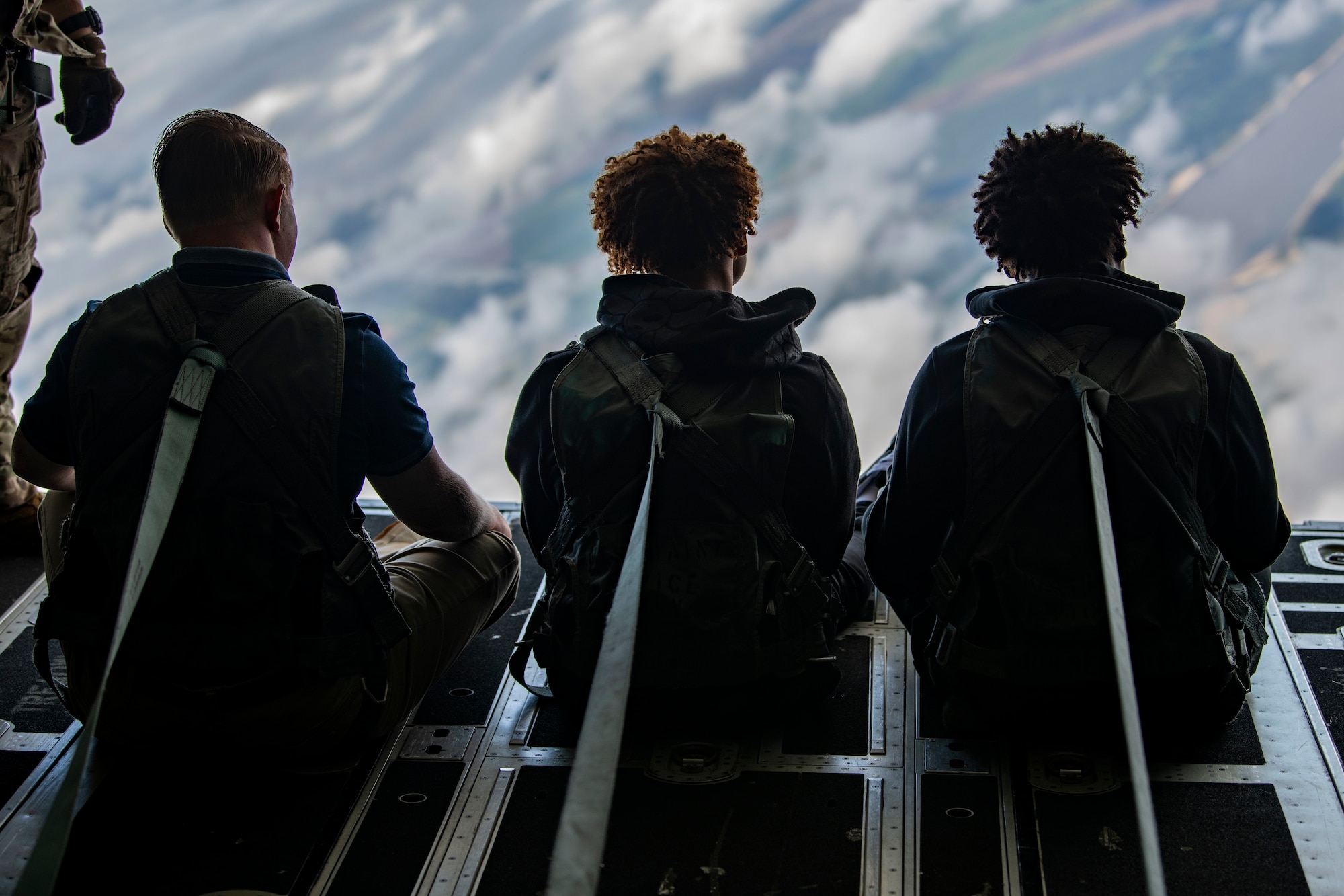 High school students from the greater Jackson, Mississippi area sit on the ramp of an MC-130J Commando II during an inspiration flight with the 15th Special Operations Squadron near Jackson, Mississippi, Sept. 13, 2024.