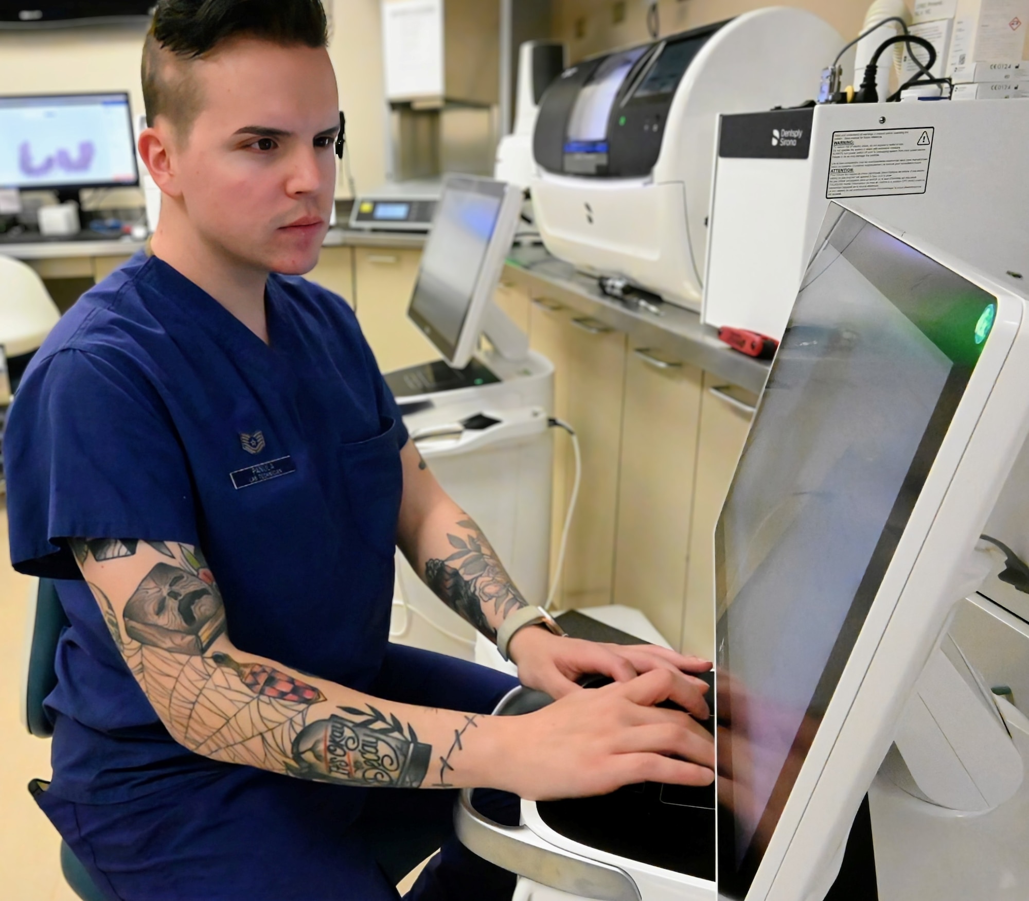 Air Force Tech. Sgt. Nicholas Panula, works with a sharp eye to digitally design a dental crown for a patient at the Los Angeles Air Force Base, El Segundo, Calif.  (U.S. Space Force photo by Amy Urbina).