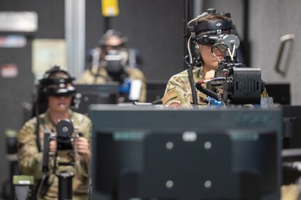 U.S. Air Force Airman 1st Class Adrian Loza-Guzman, a vehicle maintenance apprentice assigned to the 316th Logistics Readiness Squadron, participates in virtual convoy operations training during a bivouac training exercise at Fort Indiantown Gap, Pa., Sept. 4, 2024. The virtual course guided participants through potential real-world scenarios where they reacted to potential threats and improvised explosive devices. (U.S. Air Force photo by Airman 1st Class Daniel Walderbach)