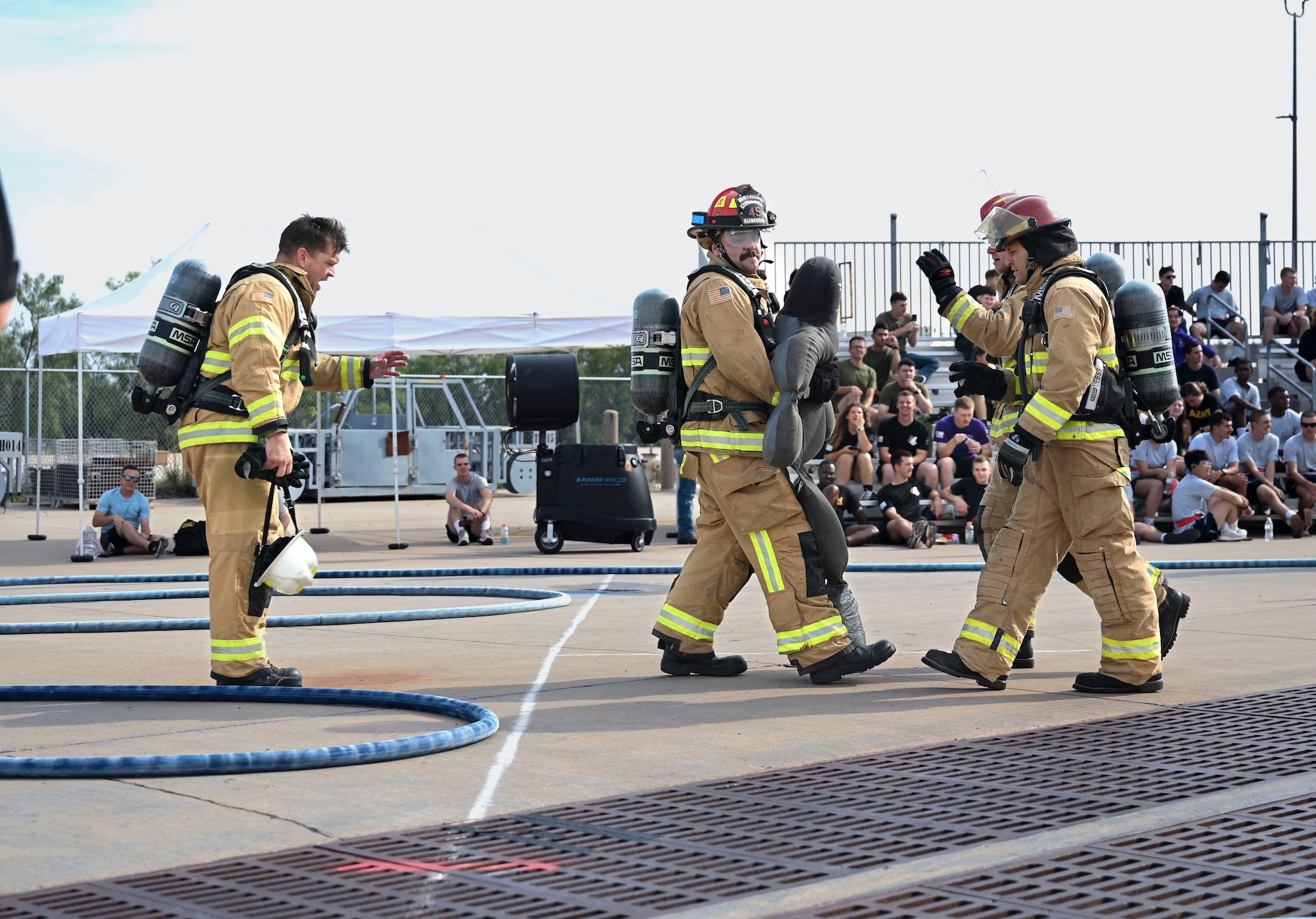The 312th Training Squadron instructor team encourages each other during the 12th Annual Blood, Sweat & Stairs event at the Louis F. Garland Department of Defense Fire Academy, Goodfellow Air Force Base, Texas, Sept. 13, 2024. Teams were made up of base leadership, individual service teams and instructors that competed against each other throughout the event. (U.S. Air Force photo by Airman 1st Class Madi Collier)