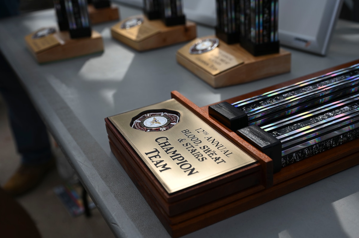 The 12th Annual Blood, Sweat & Stairs champion team trophy lays on display during the combat challenge at the Louis F. Garland Department of Defense Fire Academy, Goodfellow Air Force Base, Texas, Sept. 13, 2024. This tradition is a living memorial to the bravery and sacrifice of the firefighters who gave their lives during the 9/11 terrorist attacks. (U.S. Air Force photo by Airman 1st Class Madi Collier)