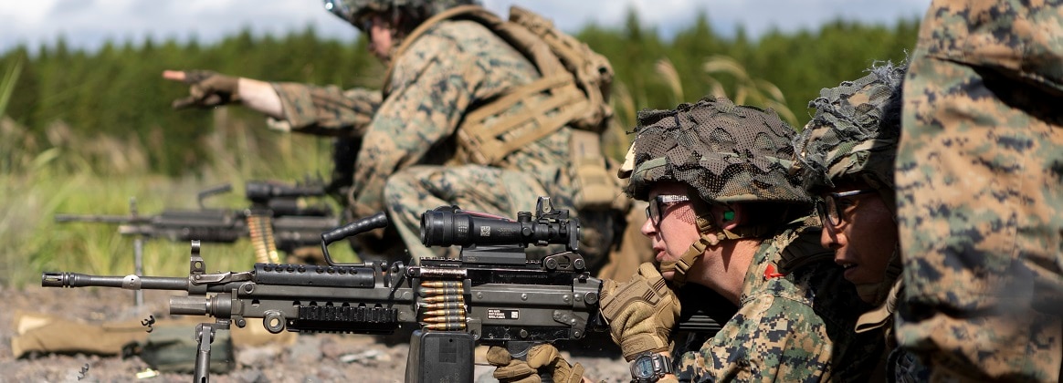 U.S. Marine Corps Cpl. Sydney Krock, a combat engineer with Marine Wing Support Squadron 171, Marine Aircraft Group 12, 1st Marine Aircraft Wing, fires a M249 light machine gun during Exercise Outlaw Wrath 24 at Combined Arms Training Center Camp Fuji, Japan, Sept. 11, 2024.