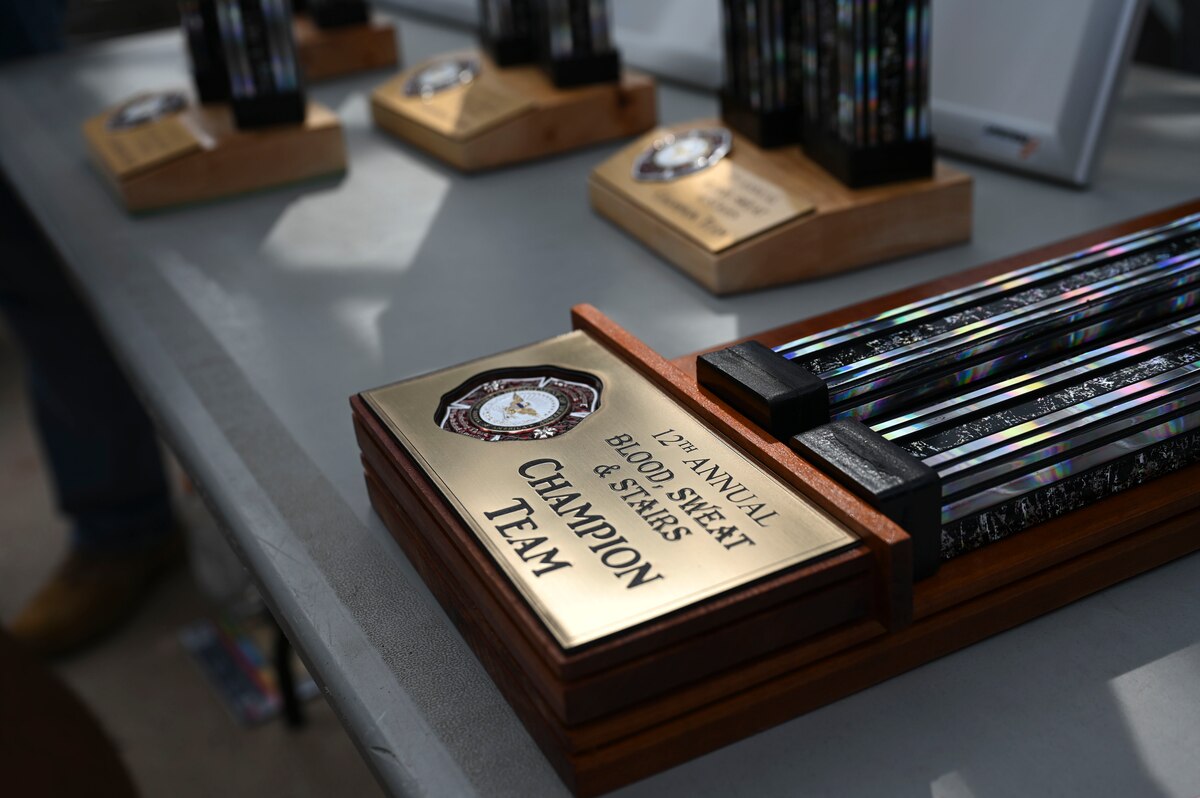 The 12th Annual Blood, Sweat & Stairs champion team trophy lays on display during the combat challenge at the Louis F. Garland Department of Defense Fire Academy, Goodfellow Air Force Base, Texas, Sept. 13, 2024. This tradition is a living memorial to the bravery and sacrifice of the firefighters who gave their lives during the 9/11 terrorist attacks. (U.S. Air Force photo by Airman 1st Class Madi Collier)
