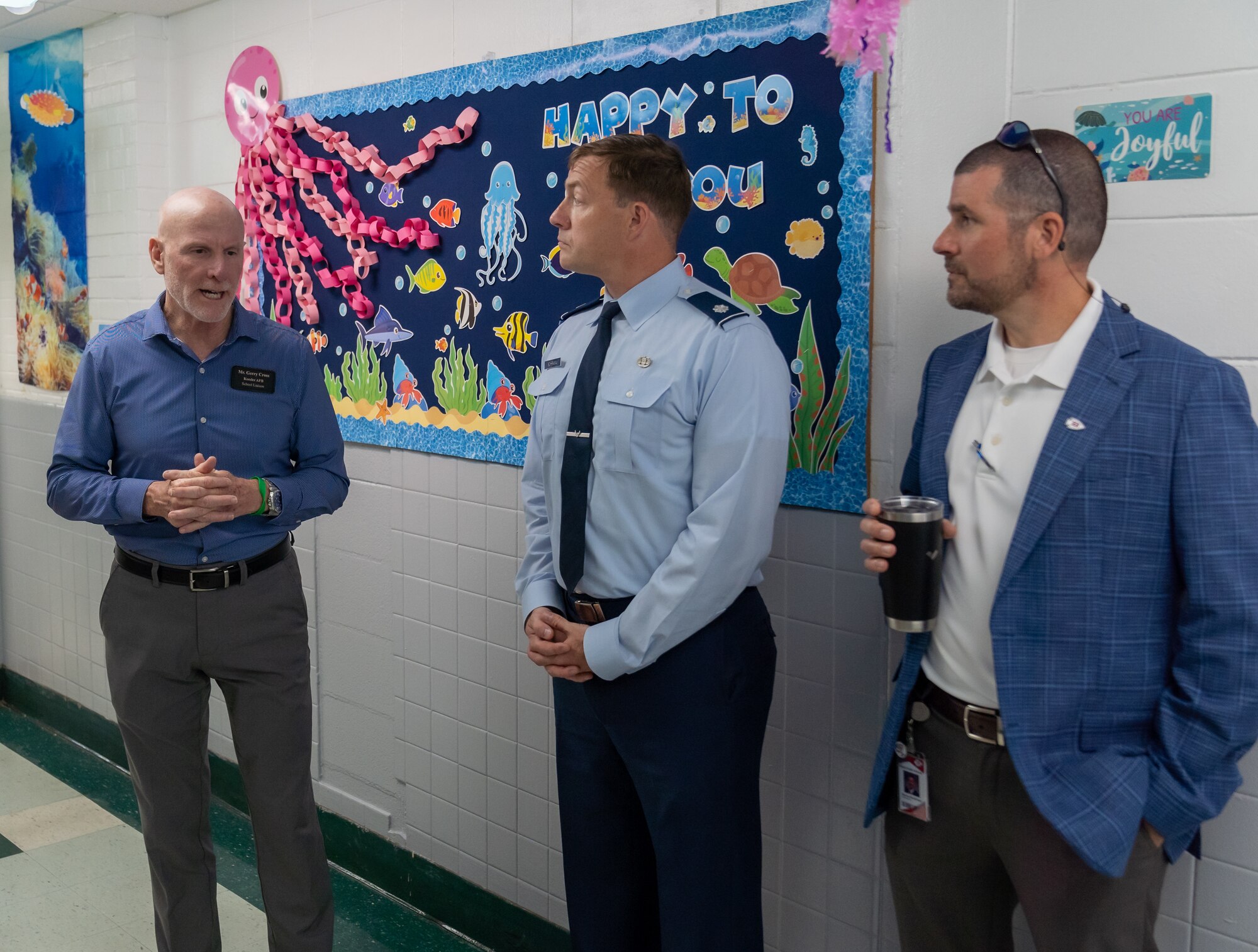 U.S. Air Force Lt. Col. Michael Schrama, 81st Training Wing military school advisor, and Gerald Cross, Keesler school liaison, receive a tour of the Back Bay Elementary School, Biloxi, Mississippi, Sept. 9, 2024.
