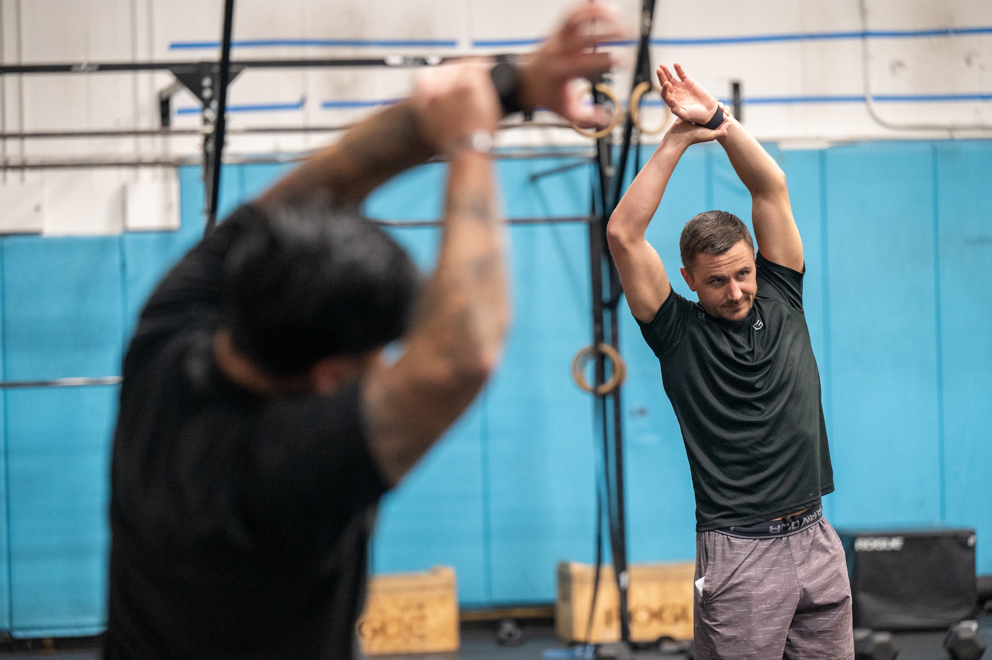 Image of people working out in gym.