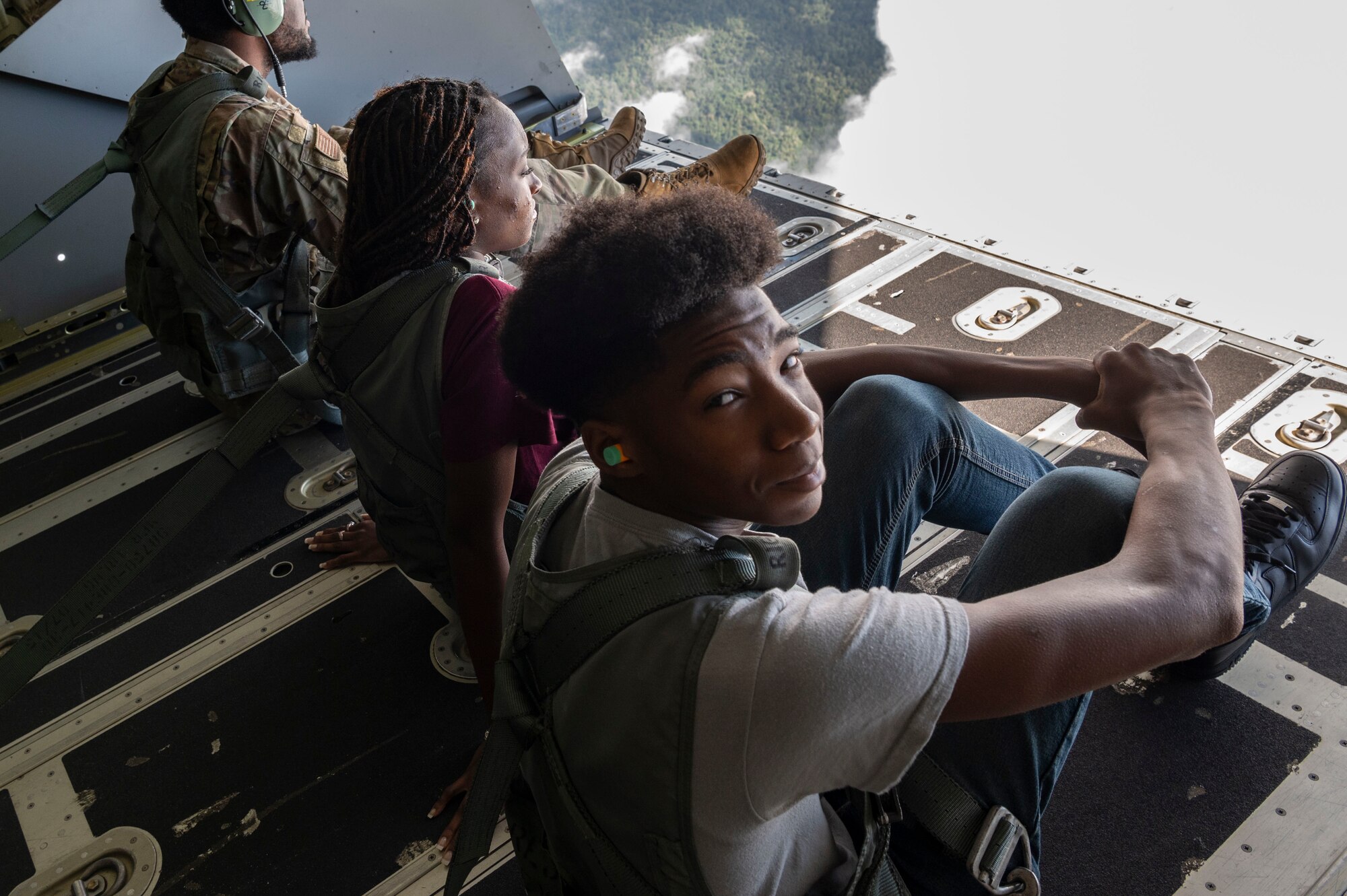 High school students from the greater Jackson, Mississippi area sit on the ramp of an MC-130J Commando II during an inspiration flight with the 15th Special Operations Squadron near Jackson, Mississippi, Sept. 13, 2024.