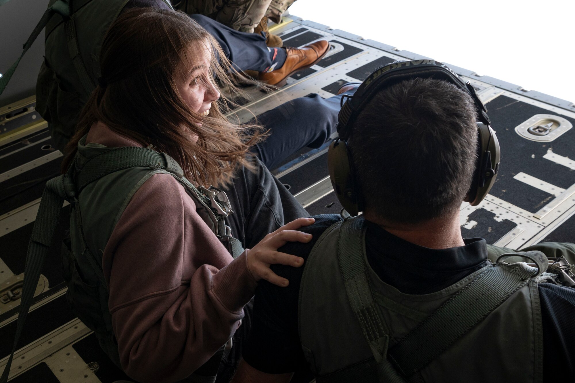 A high school student from the greater Jackson, Mississippi area sits on the ramp of an MC-130J Commando II during an inspiration flight with the 15th Special Operations Squadron near Jackson, Mississippi, Sept. 13, 2024.