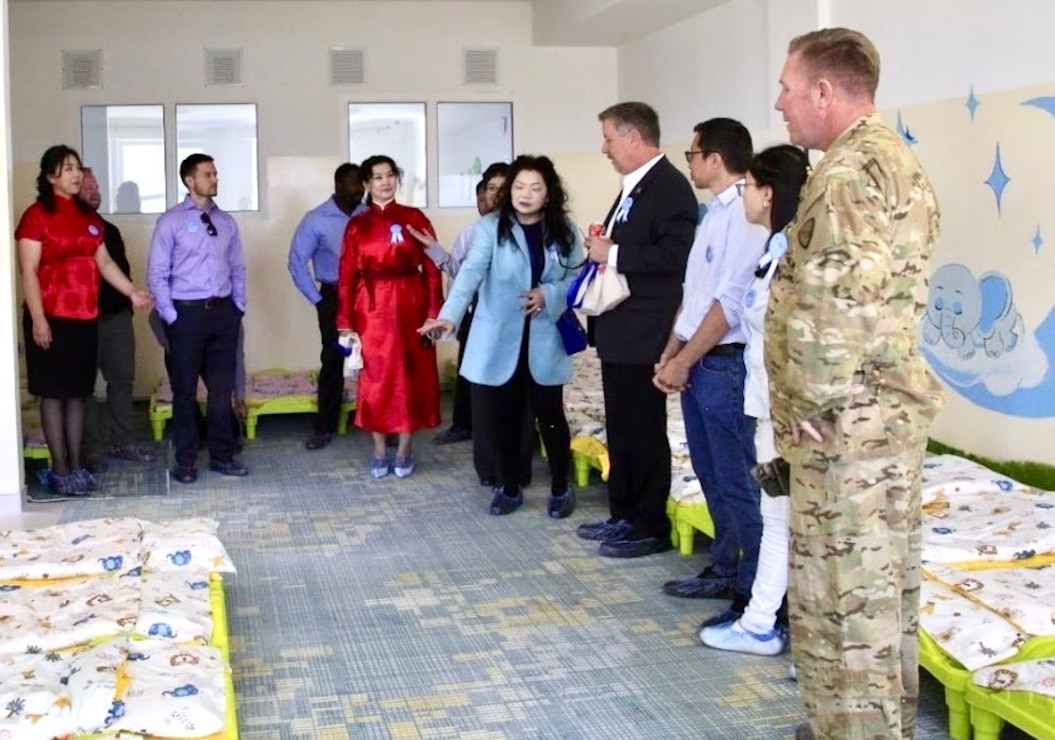 After the handover ceremony, local dignitaries led a tour of the facility. The new two-story building includes six classrooms and an auditorium. (Courtesy photo)