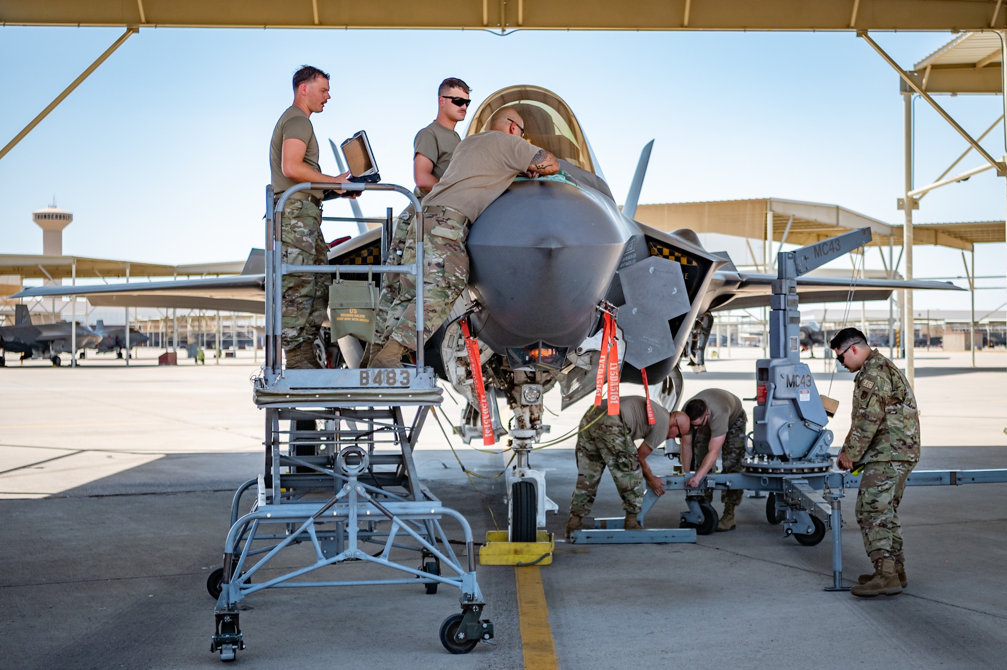 Reserve Citizen Airmen from the 944th Maintenance Group work on an F-35 fighter jet on the flight line at Luke Air Force Base, Ariz., Sept. 8, 2024. Their efforts ensure the aircraft are mission-ready under the intense Arizona sun. (U.S. Air Force photo by Tech. Sgt. Tyler J. Bolken)